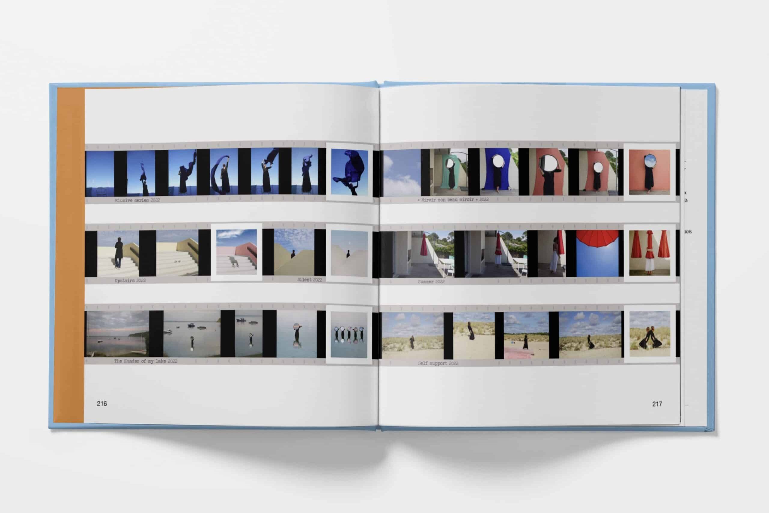 image shows a photo book laying open on a white surface.