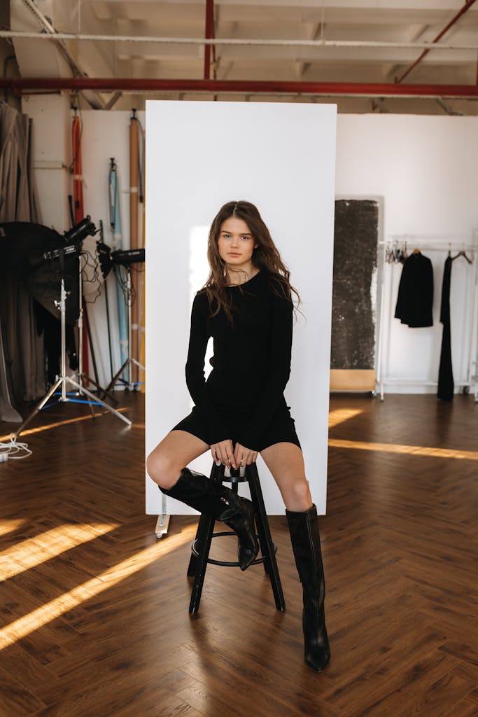 Fashion Portrait of young woman in Professional Photography Studio