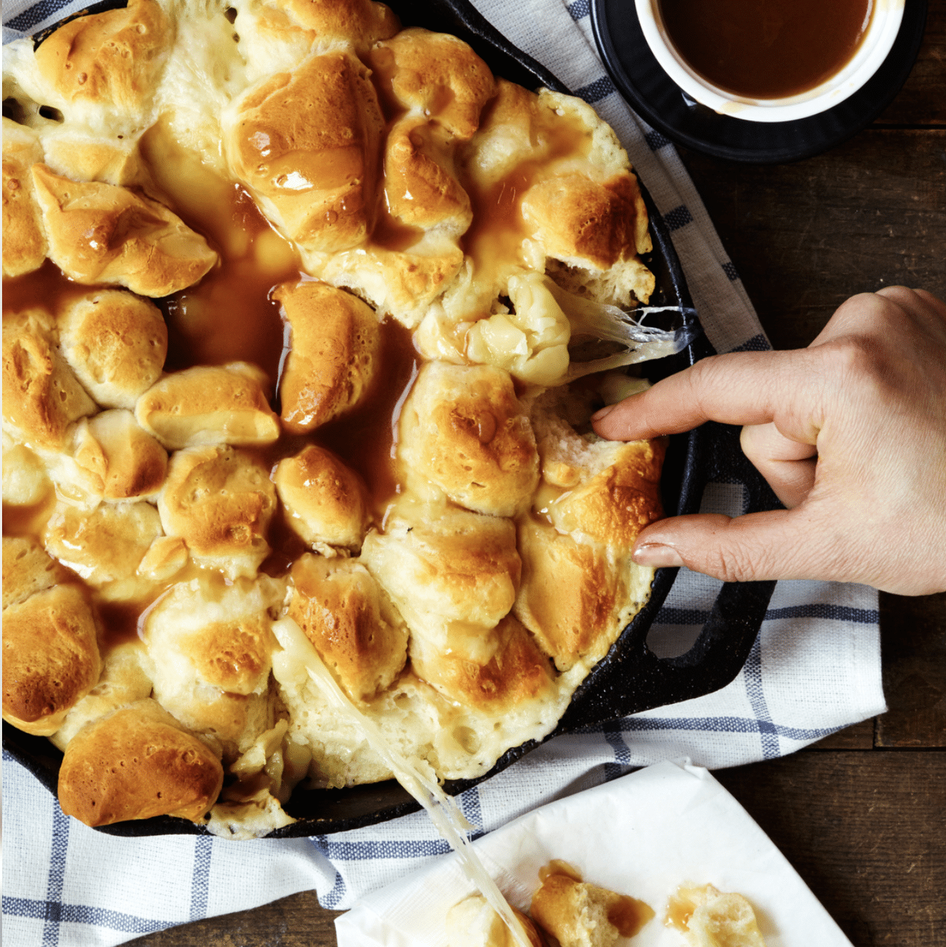 photo of skillet filled with cheesy pull apart bread by Dan Robb