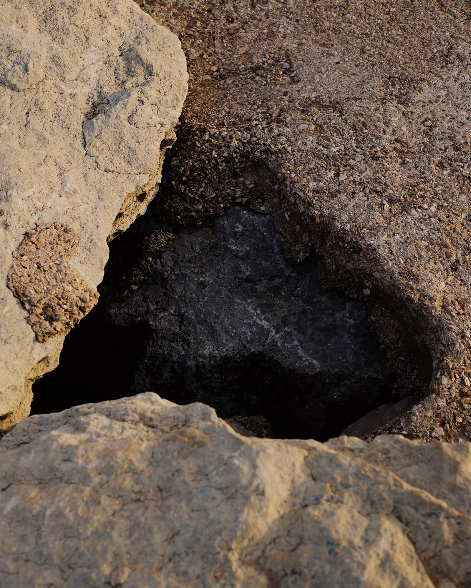 photograph of light and shadow on rocks by Alice Angelini