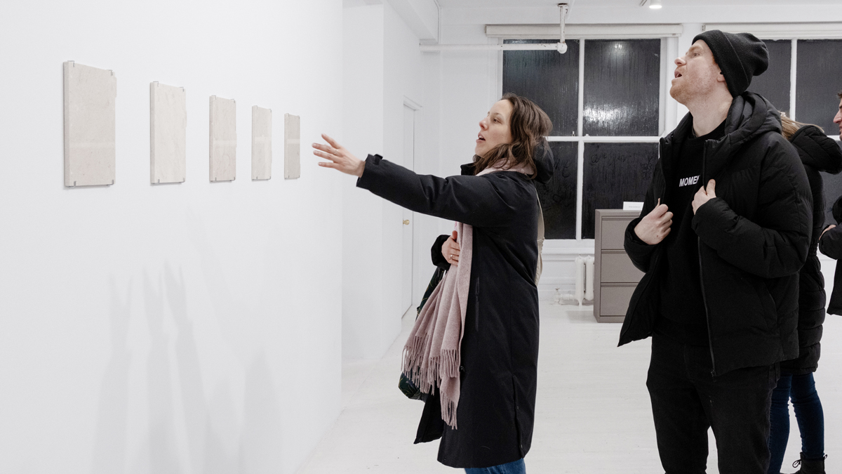 Nuit Blanche 2025, people in gallery looking at Stone Stationnery by Louis Charles Dionne