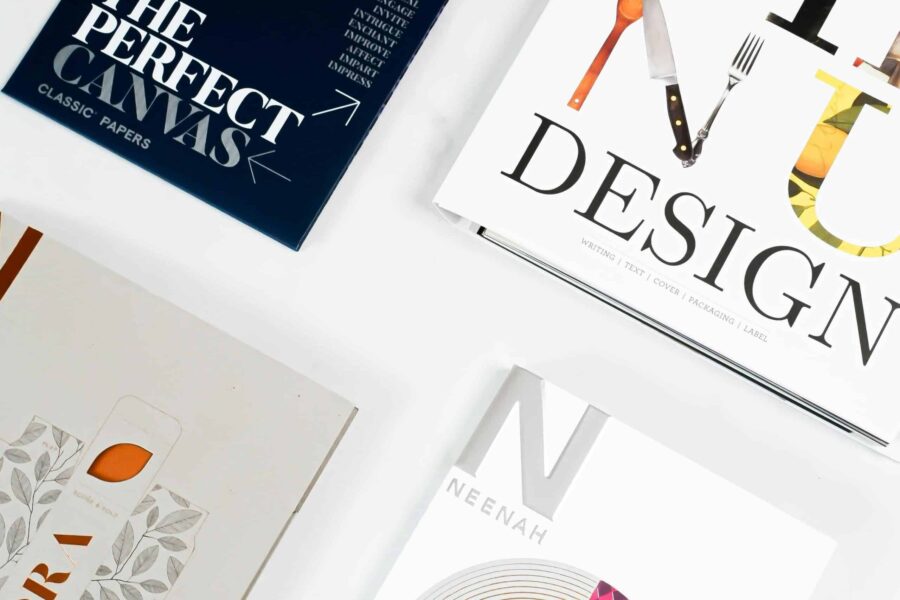 flat lay of design books and magazines on a white background scaled e1715630941906